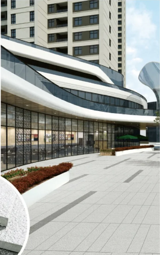 Stone-effect outdoor paving used at a commercial building entrance