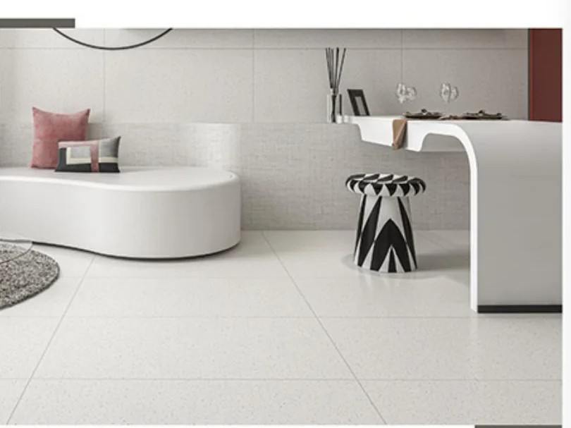 Light mineral-look porcelain tile in a refined commercial interior